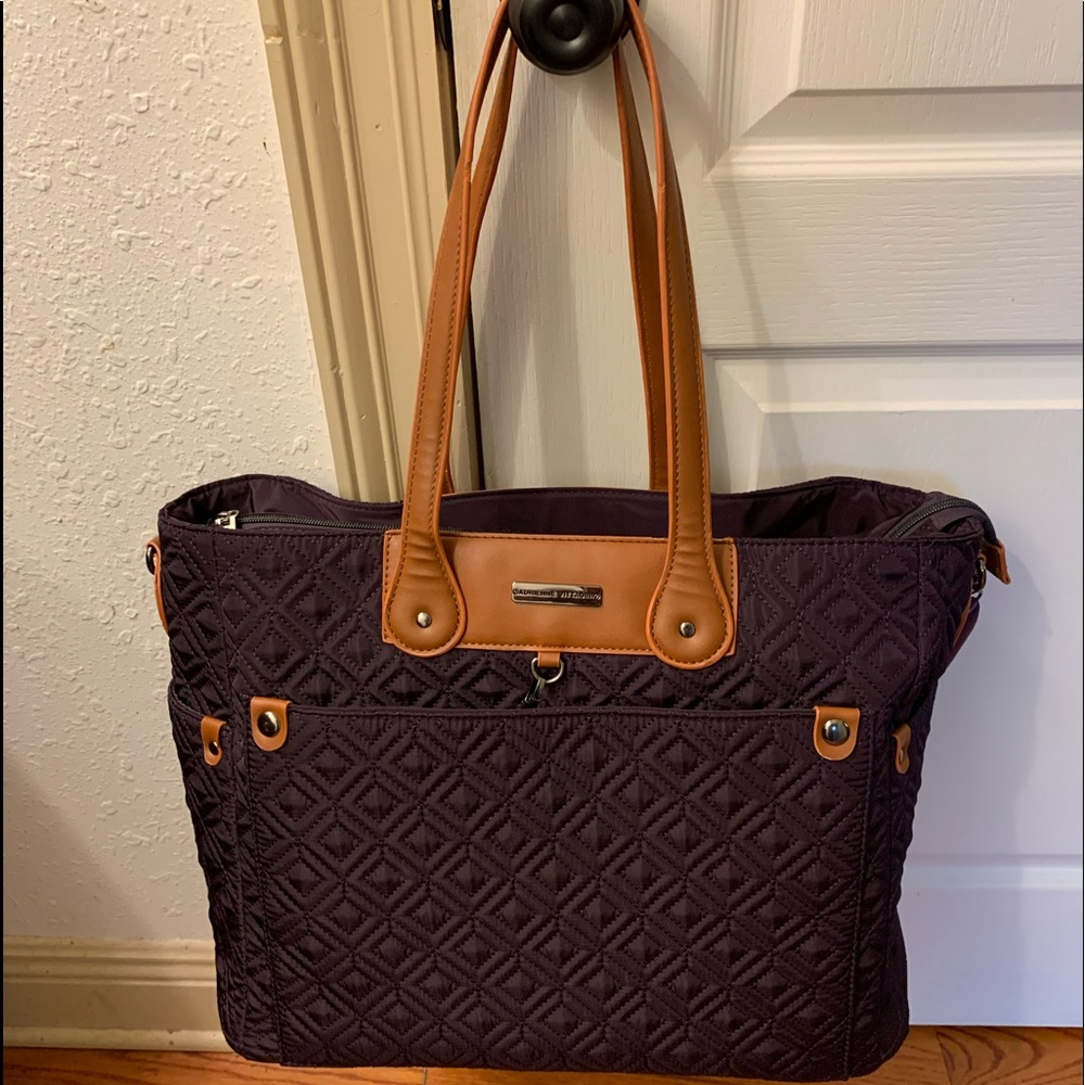 Beautiful deep purple travel bag. Never used.